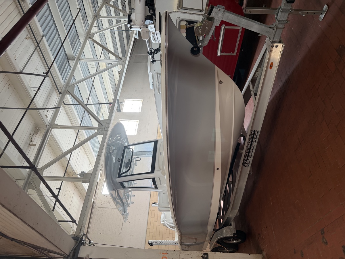 Center-console offshore boat under clerestory windows